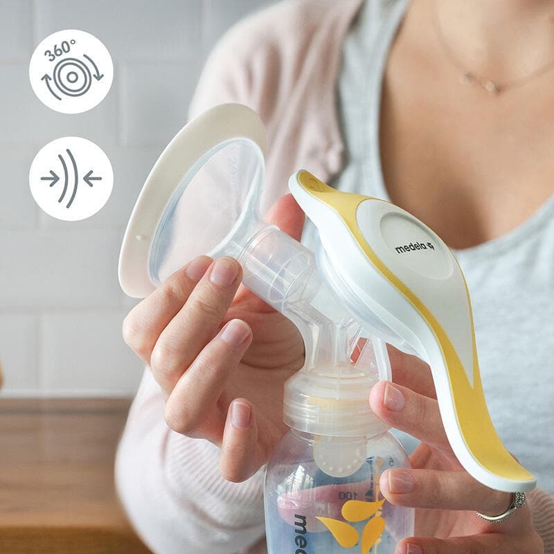 Tire-lait Manuel Harmony Flex, transparent et jaune medela h-24 — vue 1 sur 4