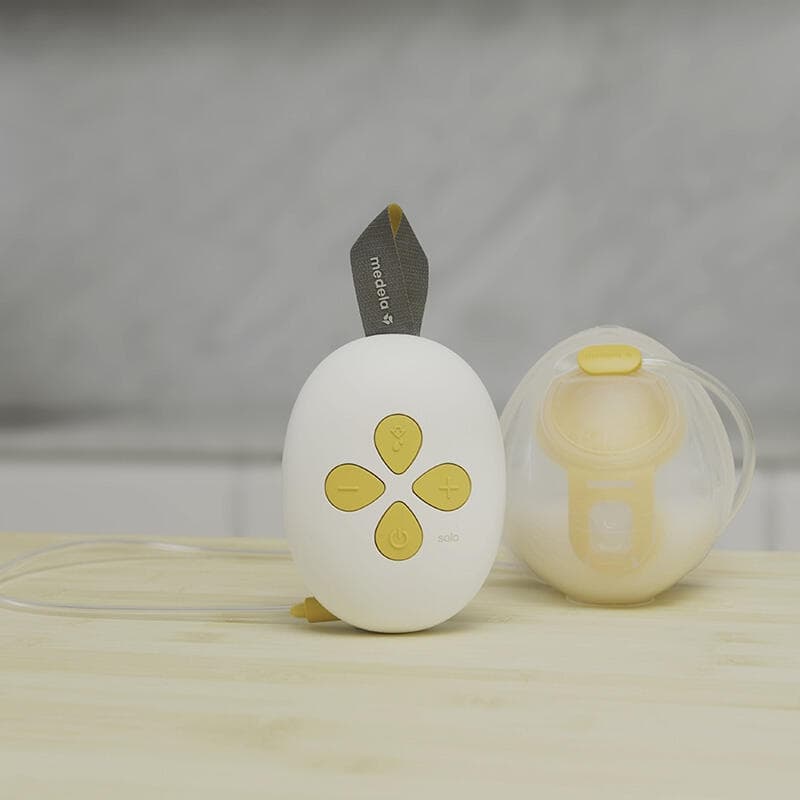 Tire-lait Electrique Simple Solo Hands-free, blanc jaune et transparent medela h-24 — vue 1 sur 4